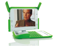 这就是首批量产的OLPC，轻巧实用，屏幕上的人物即为Negroponte先生。(Source: OLPC.org)
